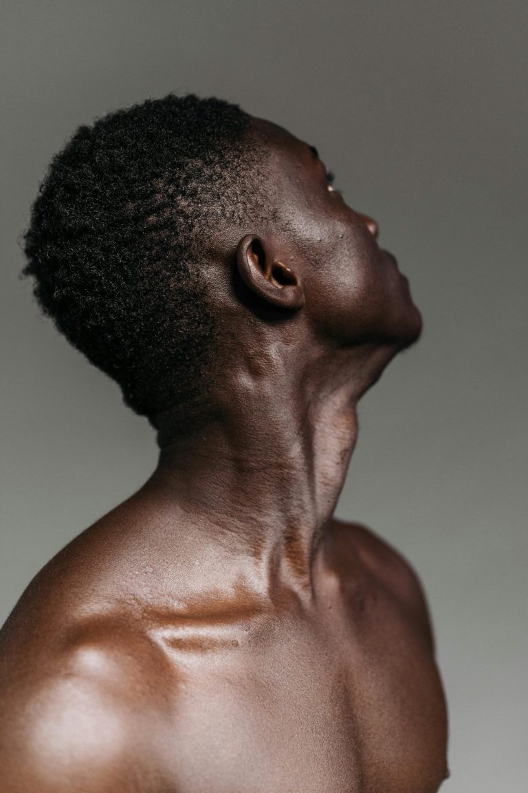 Image of a man performing a neck stretch